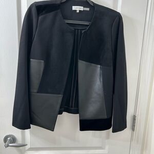 Calvin Klein Black Cropped Jacket
Faux Suede and Leather
Size 8
5 Star Seller